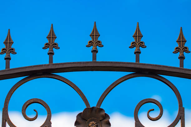 istock wrought-iron gates, ornamental forging, forged elements close-up 992080130