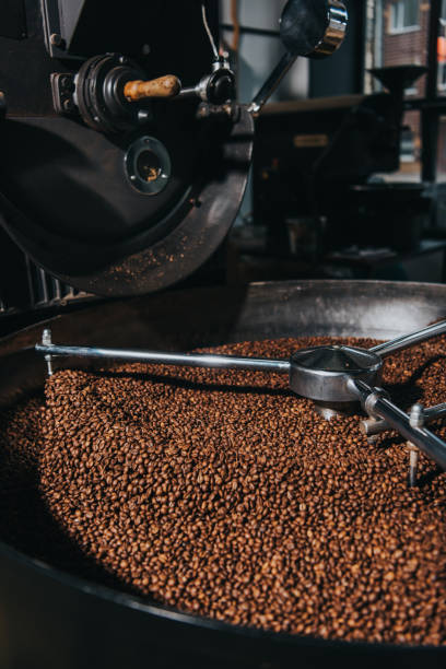 istock Roasting coffee beans in industrial coffee roaster 992080620