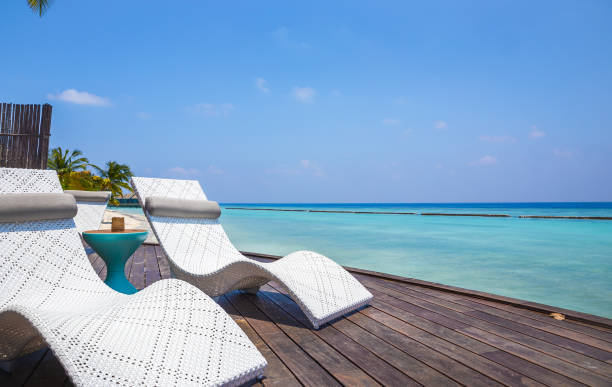 istock Deckchair and turquoise Indian ocean 992080976
