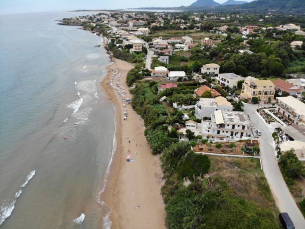 istock Aerial photo over looking small town in Corfu, Greece 992081114