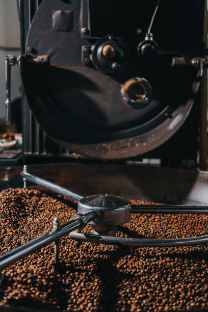 istock Roasting coffee beans in large professional coffee roaster 992081226
