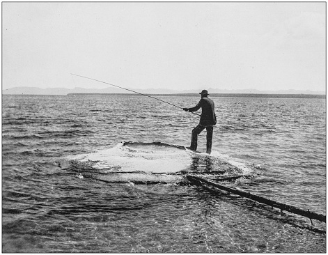 Antique photograph of America's famous landscapes: Yellowstone Lake, Fishing and cooking in geyser