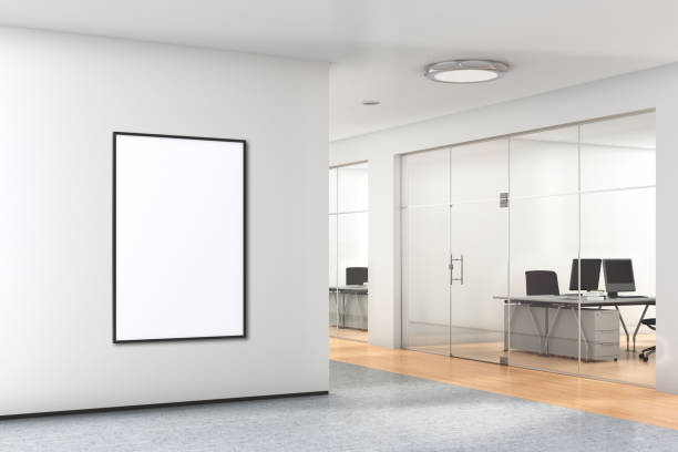 istock Blank poster on the wall in modern office 992085476