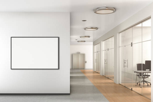 istock Blank poster on the wall in modern office 992085598