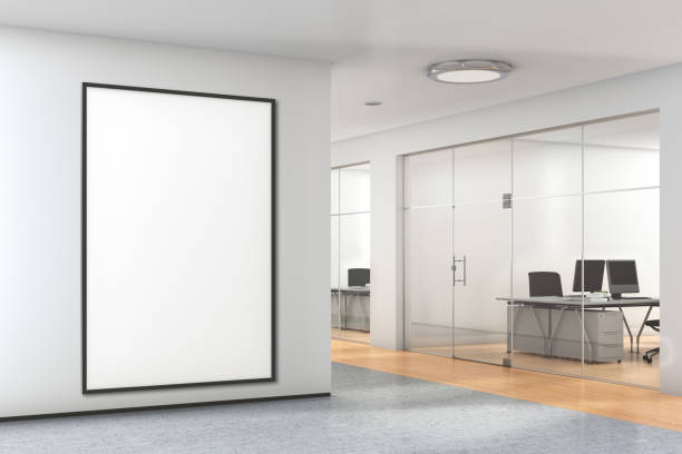 istock Blank poster on the wall in modern office 992085722