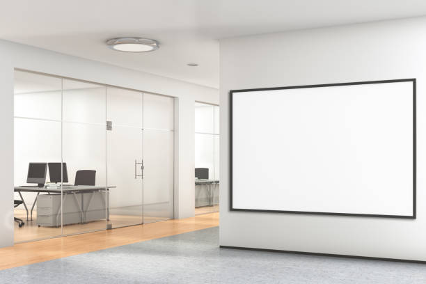 istock Blank poster on the wall in modern office 992085986