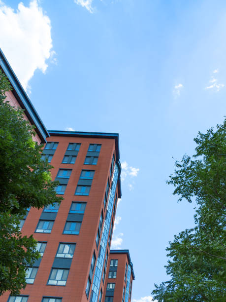 istock Modern business office building under blue sky. Office park. 992086776