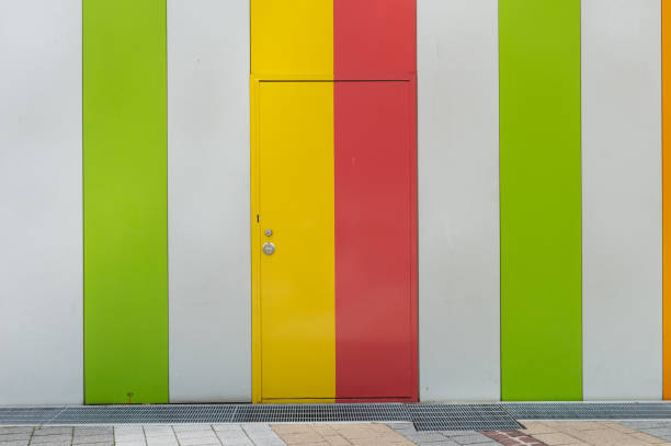 istock sidewalk by street wall & door 992095770