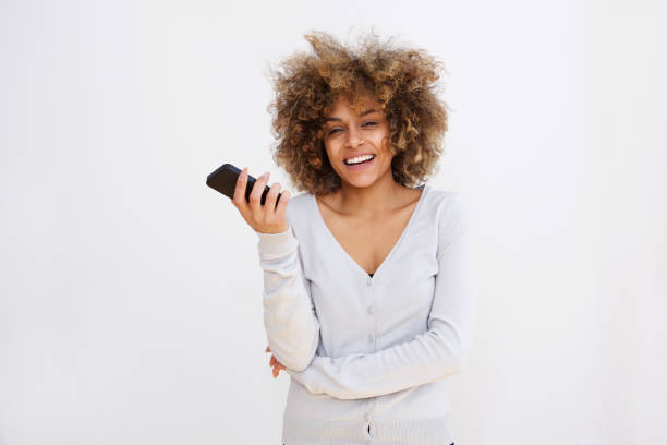 istock happy young black woman with cellphone 992112170