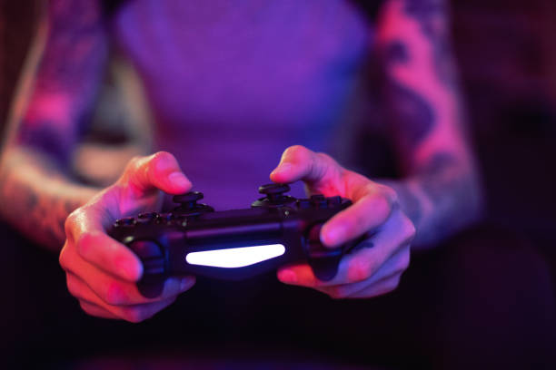 Young Women Gamer Young Women Gamer gamepad photos stock pictures, royalty-free photos & images