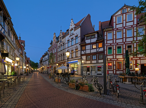 Typical half-timbered houses in twilight at dusk in old town of Goettingen, Lower Saxony, Germany