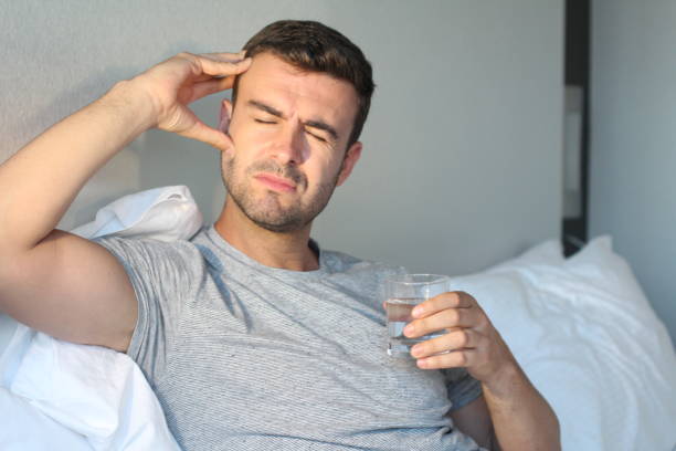 istock Man suffering from pain in bed 992132676