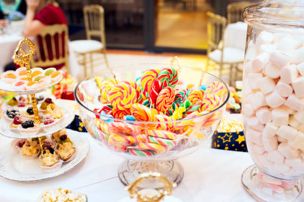 istock Colorful lollipops on a festive table 992133468
