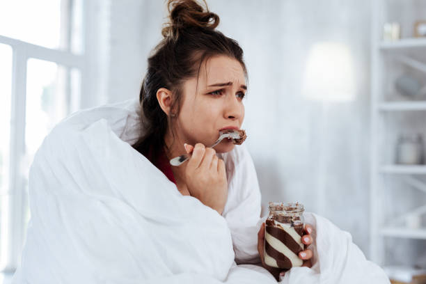 istock Woman feeling emotional while watching melodrama 992134098