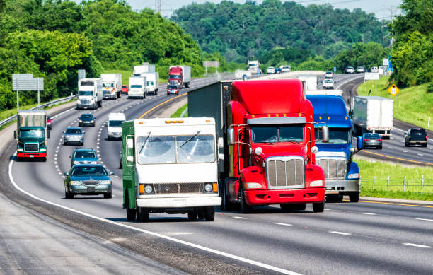 istock Red White and Blue Trucks on the Interstate 992138688