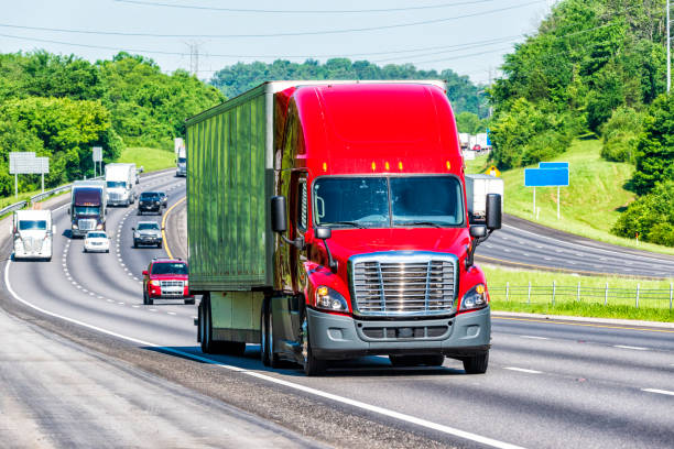 istock Red Semi Truck on Interstate Highway