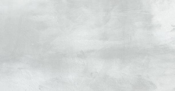 istock White washed painted textured abstract background with brush strokes in white and black shades. Abstract painting art backgrounds. Hand-painted texture. 992145890