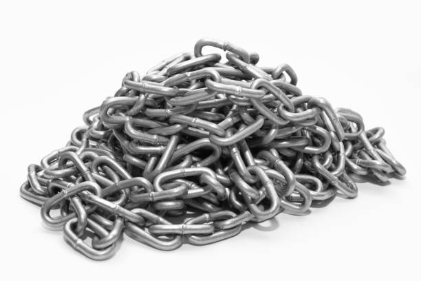 istock Metal strong chain lying on a white background 992146462