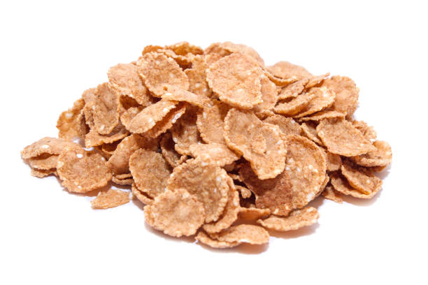 istock Breakfast is dry cereal. Breakfast flakes isolated on a white background 992146892