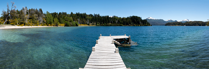 Dock made of wood in Isla Victoria, an Idyllic island located in Parque Nacional Nahuel Huapi in Patagonia Argentina