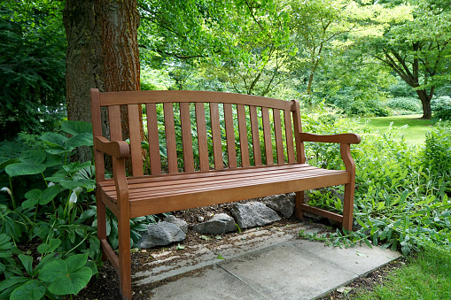 Park bench in a Bavarian park to relax and rest