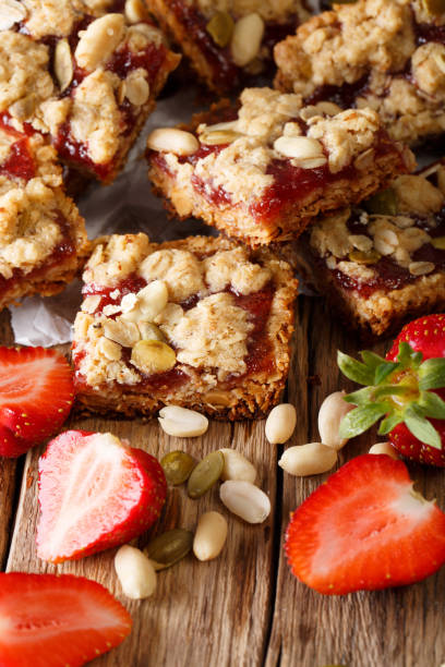 istock Peanut and Strawberry Jelly Oat Bar Squares close-up. Vertical 992170892