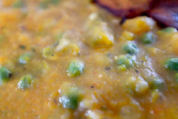 istock Close Up Of Mashed Vegetables And Peas 992177854