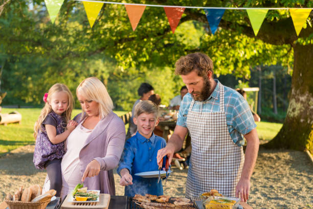 istock Family Enjoying A Barbecue 992178796