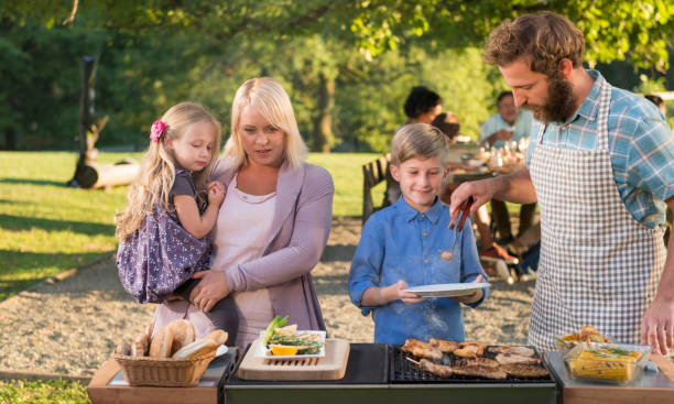 istock Family Enjoying A Barbecue 992182390