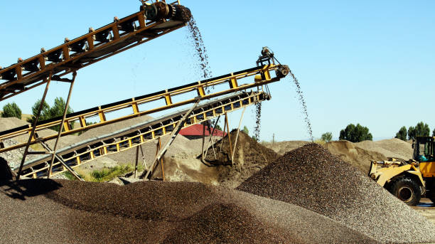 istock Quarry mine industry rock extraction heavy machinery equipment 992200600