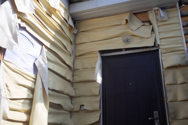 Molten vinyl siding after the fire from outside the house Molten vinyl siding after the fire from outside the house shunting yard stock pictures, royalty-free photos & images