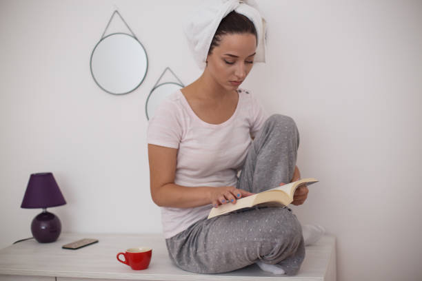 istock Girl in the hotel room 992216002