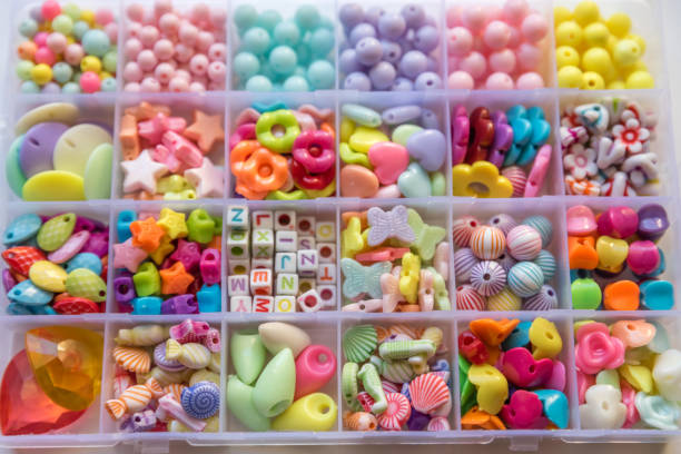 istock Many Different Beads and Jewelry Isolated on White Background 992216010