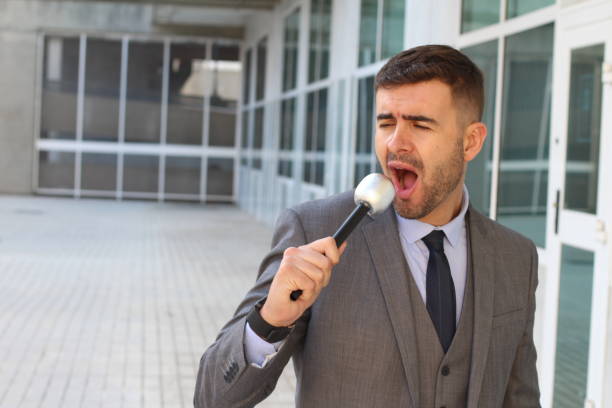 istock Businessman singing in the office 992220276