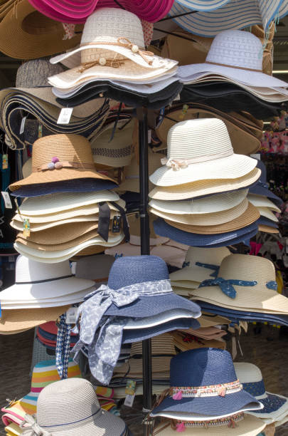 istock Many summer straw hats in shop, Greece 992259844