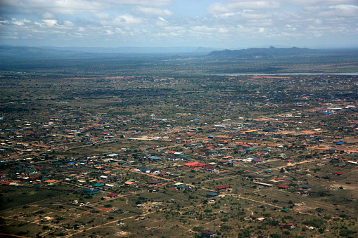 Urban sprawls of Accra, Ghana, next to Tema, as seen from the airplane towards the landside.