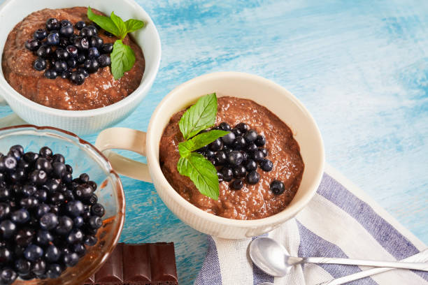 istock two boils with Chia seed pudding with berries and carob 992304366