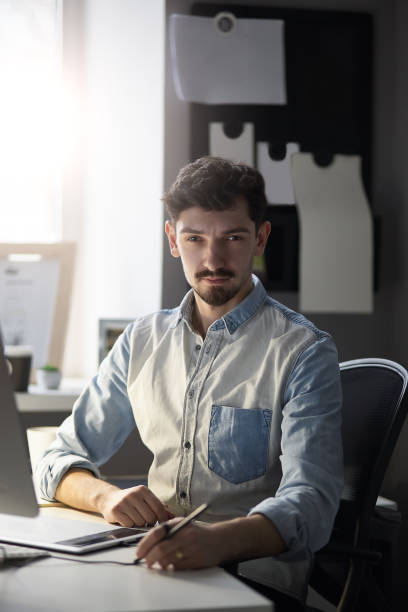 istock Portrait of young confident entrepreneur 992311508
