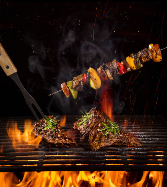 istock Beef steaks on the grill with flames 992316484