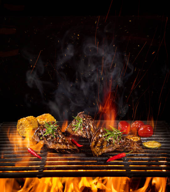istock Beef steaks on the grill with flames 992316622