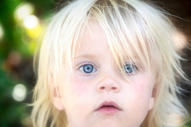 baby in flowers