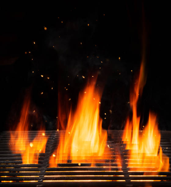 istock Empty grill with flames, ideal for product placement 992343940