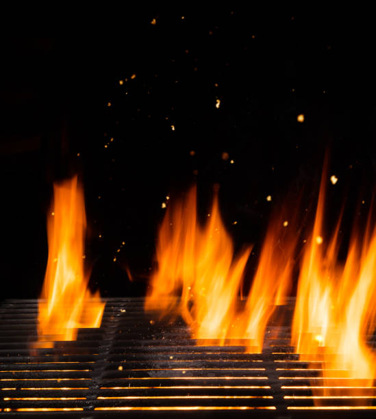 istock Empty grill with flames, ideal for product placement 992343956