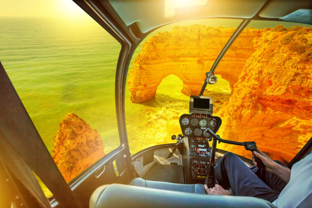 istock Helicopter on Marinha Beach Natual Arches 992347200