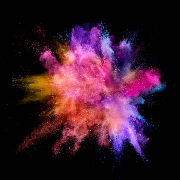 istock Explosion of coloured powder on black background 992348210