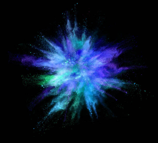 istock Explosion of coloured powder on black background 992350770