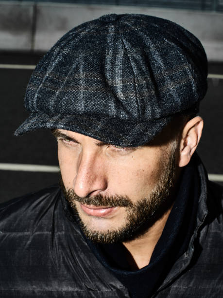 istock Brutal portrait of a man in a cap 992366434