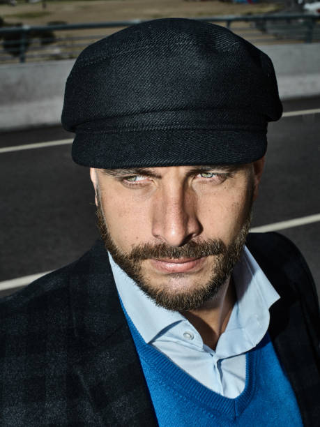 istock Brutal portrait of a man in a cap 992366490