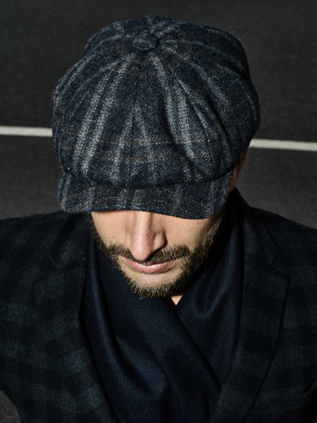 istock Brutal portrait of a man in a cap 992366530