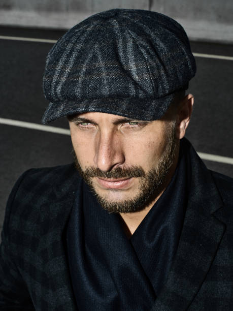 istock Brutal portrait of a man in a cap 992366564
